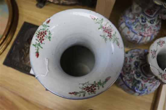 A 19th century Chinese blue ground dragon vase and a pair of famille rose vases tallest 36cm